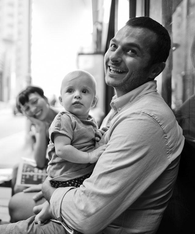 Street portrait of a family in the cafe. Leica 21mm Summilux-M ASPH f/1.4. © Thorsten Overgaard. 

