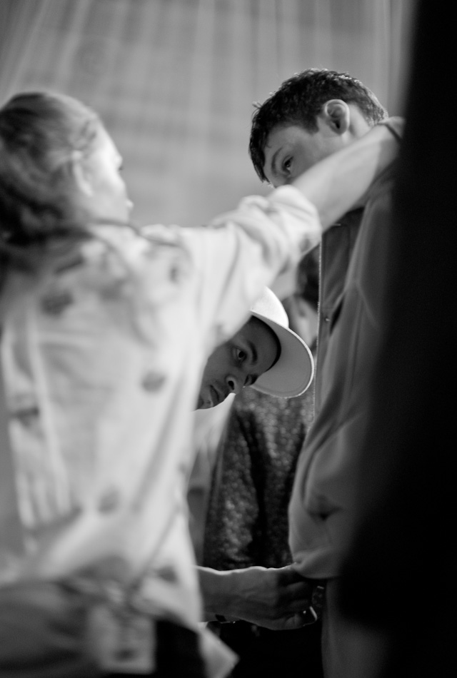 Designer Silas Adler of Soulland and a stylist fits the models prior to the Soulland catwalk at Copenhagen Fashion Week AW13. © Thorsten Overgaard, Leica M Monochrom with Leica 50mm Noctilux-M ASPH f/0.95