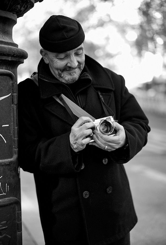 There is a consistent love and buying power among Leica fans for anything classic Leica. Here, Mr. Jochen Bolkenius in Berlin with his Leica M3. © Thorsten Overgaard.