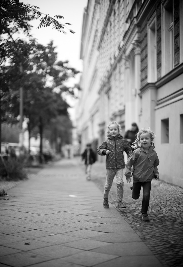Berlin, September 2014. I saw these kids coming and had fairly good time to kneel down, set the focus and prepare the frame I wanted. Leica M 240 with Leica 50mm Noctilux-M ASPH f/0.95