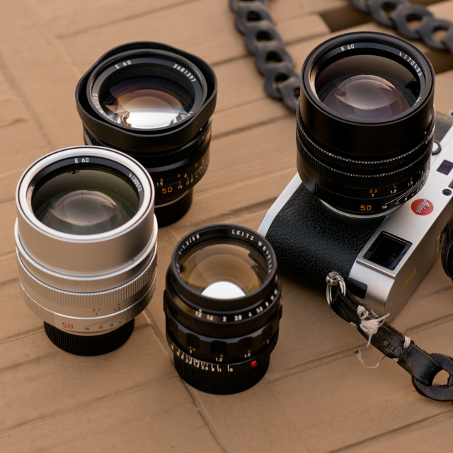 The Noctilux "King of the Night" lens. From left the 0.95 in silver (same on the camera, in black, the f/1.0 in the back and the rare and expensive first model, the f/1.2 in the front. 