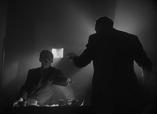 These two stills from Citizen Kane (1941, cinematography by Gregg Toland, directed by Orson Welles) use the light in the room (spread with mist from a fog machine), which also creates light rays that are broken by the silhouettes. It's almost too much effect, except it looks beautiful.