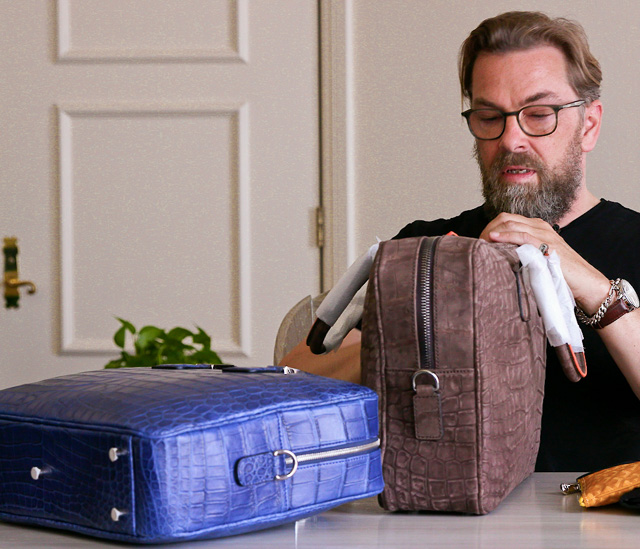 The Von Camera Bag in blue croc (left) and grey croc (right).