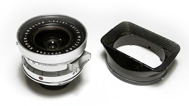 This lens was produced by Leitz Wetzlar from 1963 - 1980 and uses a 90° angle.
[Before this lens Leica produced a f:4.0 from 1958 - 1963 
and then a f:2.8 which replaced the f:3.4 from 1980]