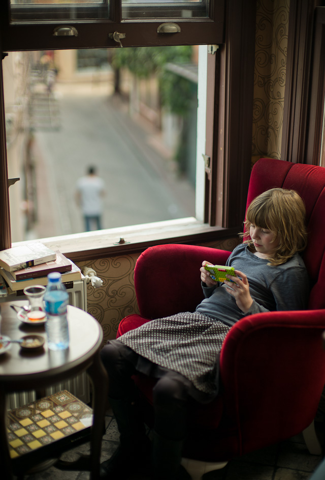 Working hard on Facebook. My daughter Robin Isabella in Istanbul. Leica M Type 240 with Leica 50mm Noctilux-M ASPH f/0.95. © Thorsten Overgaard.