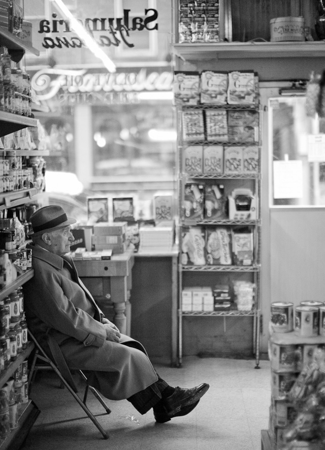 The former owner of the Italian delicatessen store Salumeria Italiano in Boston, Mr. Erminio Martignetti sits most days in the store and greets cutomers, wearing stylish hat and all. His son and a team of very Italian staff run the business these days.