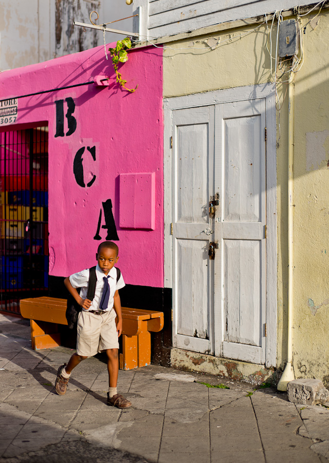 School boy in Saint Kitts. I had to wait a few minutes by this wall before a desirable subject walked into the frame. Each school has their own school uniforms, so one can tell from the uniform which school the kids are from.Leica M Type 240 with Leica 50mm Noctilux-M ASPH f/0.95.© 2014 Thorsten Overgaard. 