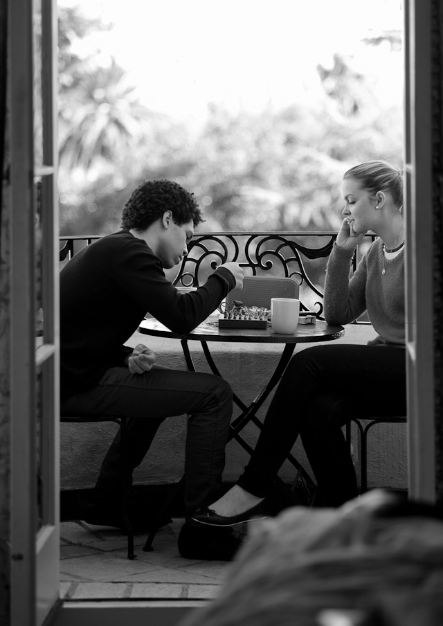 Zach and Caroline having a play of chess on the balcony in Hollywood. Leica M 240 with Leica 90mm APO-Smmicron-M ASPH f/2.0. December 2014.