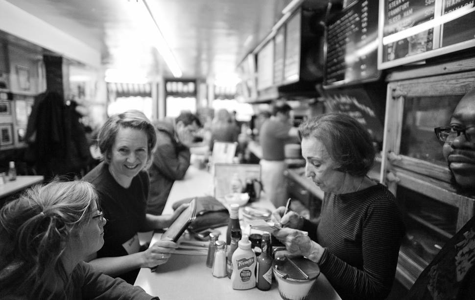 Saturday morning inside Charlie's Sandwich Shoppe. This place is just around the corner of where I stay in Boston and has become part of my morning ritual. The chef there has three old Leica M3, M2, IIIf cameras and 15 lenses from back when that he will send me more on so we can get him upgraded to Leica M9 or something  The place features great food, resulting in a waiting line outside on Saturdays. Obama was here, and so was Al Gore and Sammy Davis Jr.. Charlie's is also known for serving Afro-American musicians when nobody else would, back when. Leica M 240 with Leica 21mm Summilux-M ASPH f/1.4. Thorsten Overgaard © 2014
