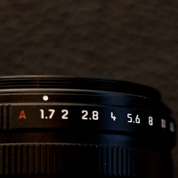 Aperture ring

The maximum aperture of the Leica Q2 lens is f/1.7. In my opinion, that's where the aperture should be set so as to utilize the full potential of bokeh and depth of field.

The aperture can be turned to more depth of field by going to f/5.6 or such, for example when doing macro.

The aperture ring can also be locked in A (Auto) which will make the Leica Q2 determine the aperture, not based on depth of field, but as a measure to control light. 

