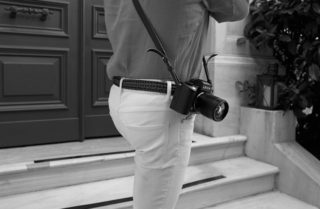 The camera should hang by the hip. Here is me with my Leica SL2 and the Magnum Camera Strap. © Thorsten Overgaard. 