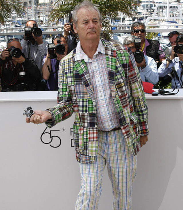 Bill Murray in Cannes working the small Minox Leica. 