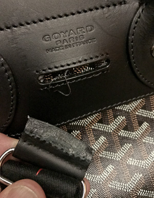 The broken strap for the Goyard Alpin. It couldn't hold a backpack loaded with 8 kilos (16 pounds).