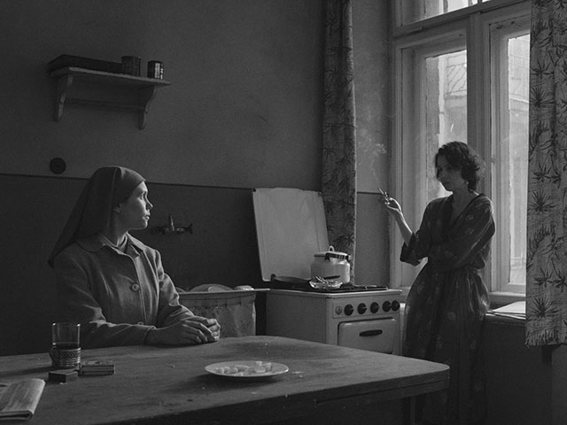 Edge light defines the cigarette smoke and the face by the table, as well as other shapes in the room. If you imagine you and your camera are standing by the window, there would no edge light, instead it would be soft light with lower contrast. Ida (2013, directed by Pawel Pawlikowski, cinematography by Ryszard Lenczewski and Lukasz Zal).