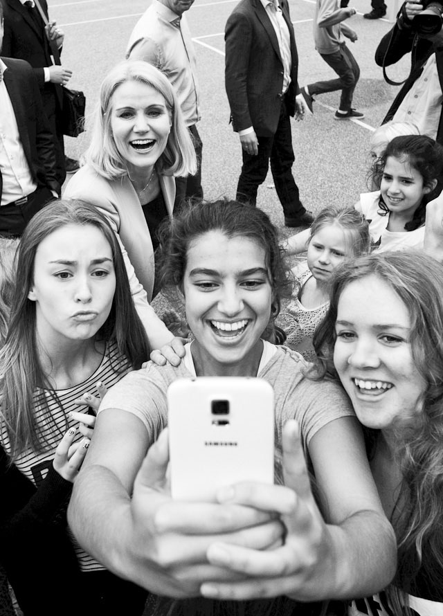 Denmark, September 2014. The DAnish Prime Minister (upper left corner) does a selfie with school kids in Denmark. Leica M 240 with Leica 21mm Summilux-M ASPH f/1.4. © 2014-2016 Thorsten Overgaard.