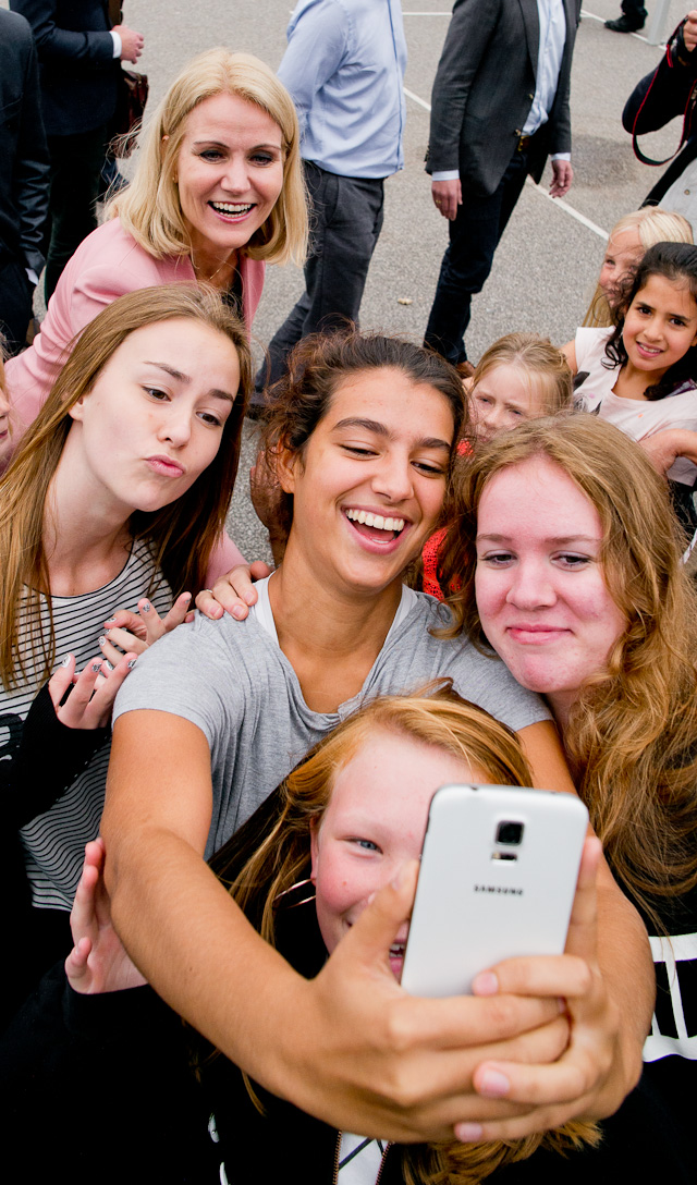 Tho appreciate this photo of the Danish PM, one has to know her face (in the top left corner) as well as the picture that went around the world of her nd Obama doing a selfie. It has become her trademark to do slfies now, so guess what happens when she meets 800 school kids. They all want selfies with her. Leica M 240 with Leica 21mm Summilux-M ASPH f/1.4.