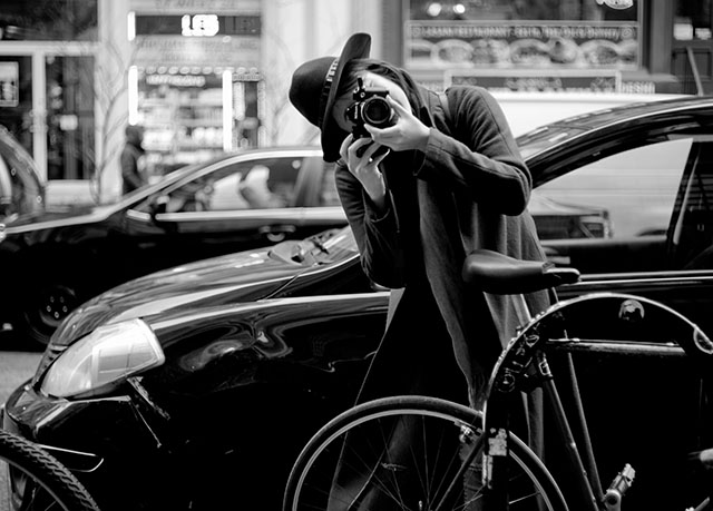 A female Nikon film photographer in New York. Leica M240 with Leica . © Thorsten Overgaard.