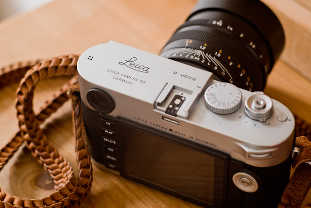 A classic Leica engraving with Made in Germany and the serial number applied to the silver chrome Leica M 240. This camera is with a Leica 50mm Noctilux-M ASPH f/0.95 lens and an Annie Barton braided strap in natural leather. 