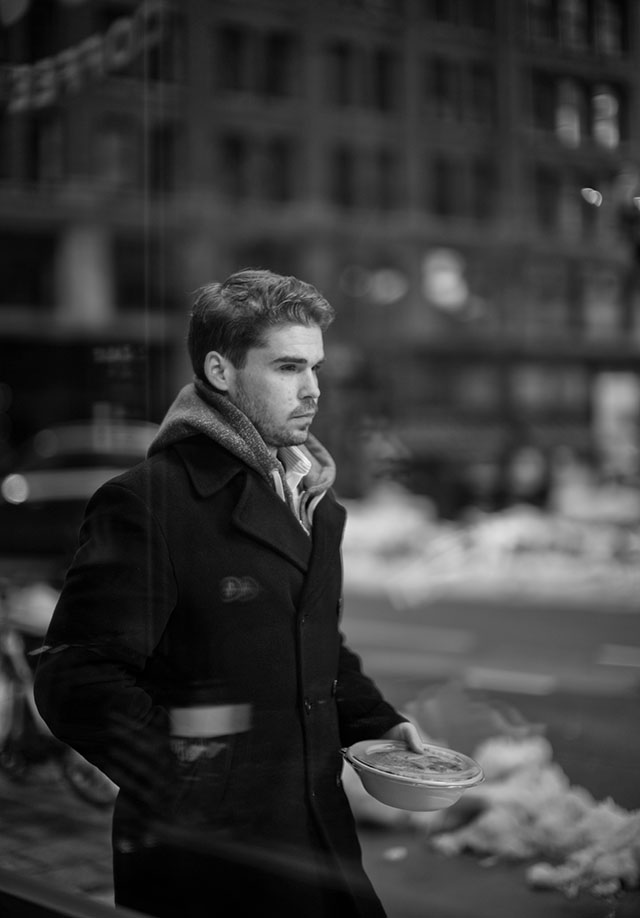 There's also this sneaky way of doing street photography on cold days: sit inside a café and photograph people walking by outside the window. 200 ISO. Leica 50mm Noctilux-M ASPH f/0.95. © Thorsten Overgaard.