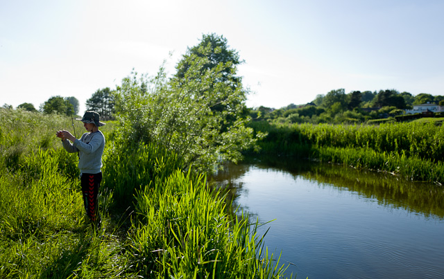 Fishing in the Danish summer evening. We were out on a walk 8 PM, and there he was, fishing. Leica Q at 100 ISO, f/1.7, 1/3200 second. © 2015 Thorsten Overgaard.