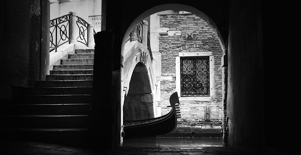 I am guided by light and aesthetics, but I also try to add something of my own to it. In this case, I knew about this place and had to ask people how to find it. Then I spent maybe twenty minutes getting the right composition of the gondolas at just the right moment, and with no tourists on the bridge. This is one of my absolute favorite images from the trip." Leica Q3 43. © Christopher West. 
