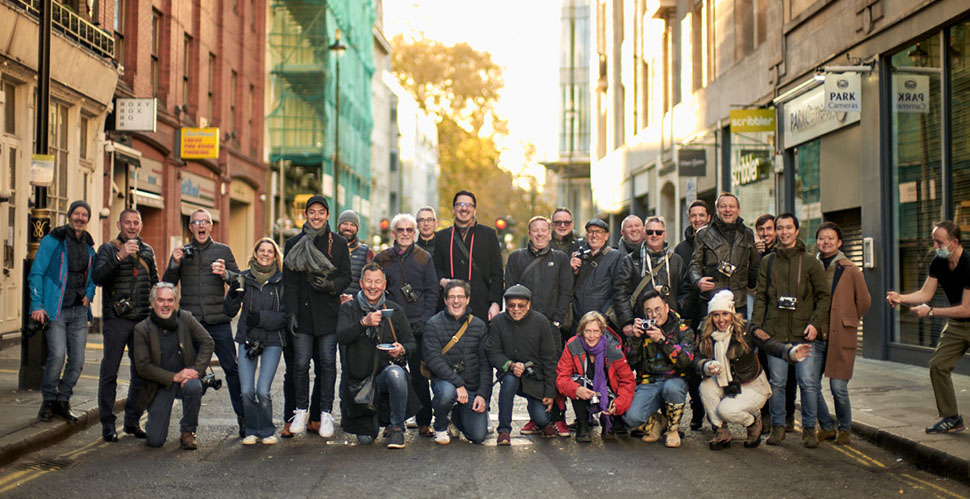 The "Walk with Me" London group who met for a free two hour sunrise walk on a cold Sunday at 7:30 AM in Soho. We got rewarded with sunshine and empty streets, and at the time this group photow was taken, we had our first coffee as well. Leica SL2 with Leica 50mm Noctilux-M ASPH f/0.95. © Thorsten Overgaard.