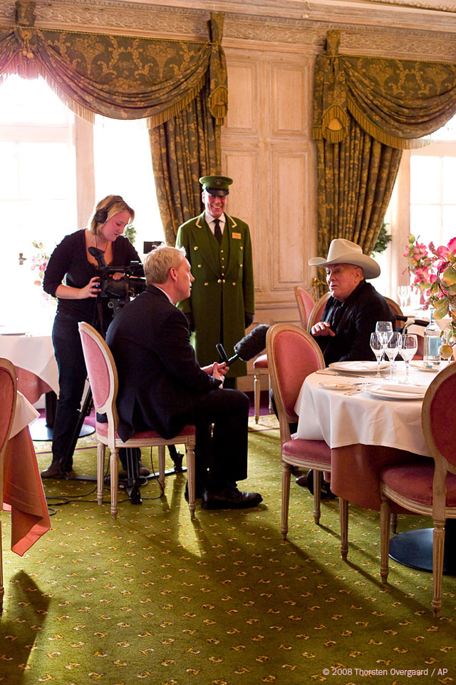 American actor Tony Curtis being interviewed at The Herrods in London by Niel Sean of FOX Entertainment and Emma Brumpton, October 2008