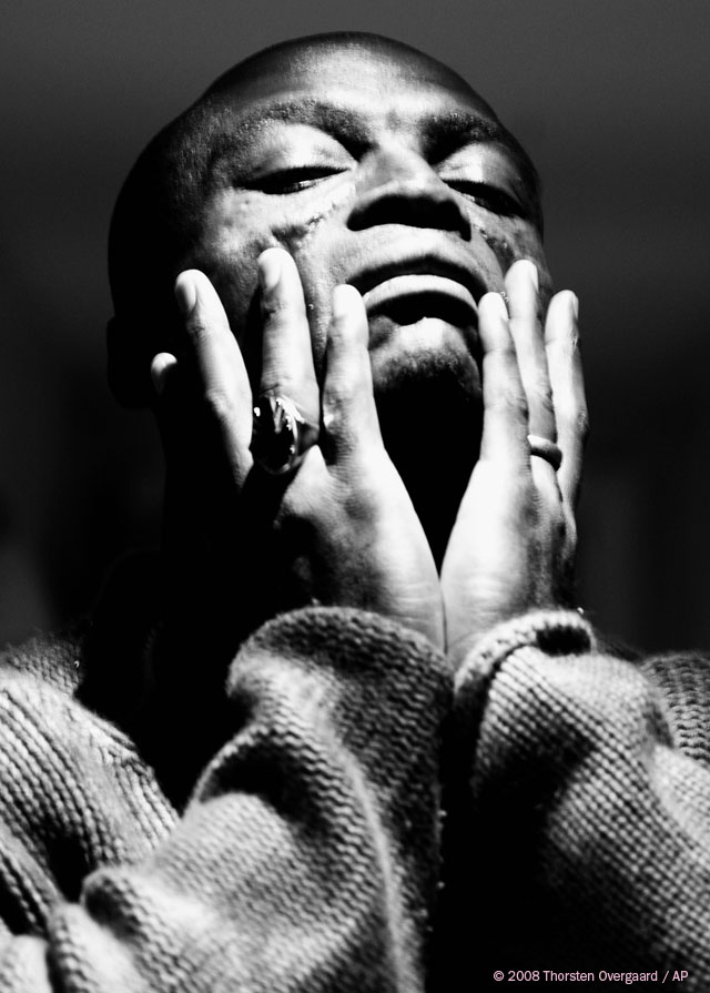 British soul singer and songwriter Seal in an exclusive photo session at The Soho Hotel in London, promoting his new album “SOUL," October 2008 (AP Photo/Thorsten Overgaard). Leica R8 DMR with Leica Vario-Elmarit-R 35-70mm f/2.8, 200 ISO, 1/15 sec (with mirror up which create more movement of the camera as the mirror and camera is shooting in turn, fast after each other). Converted to b&w (and contrast increased dramatically) in Hasselblad/Imacon FlexColor 4.6 RAW converter. © Thorsten Overgaard. 