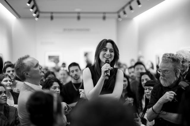The artist, Sara Messinger, giving a few words at the opening. Leica M11-P with Leica 50mm Noctilux-M ASPH f/0.95. © Thorsten Overgaard.