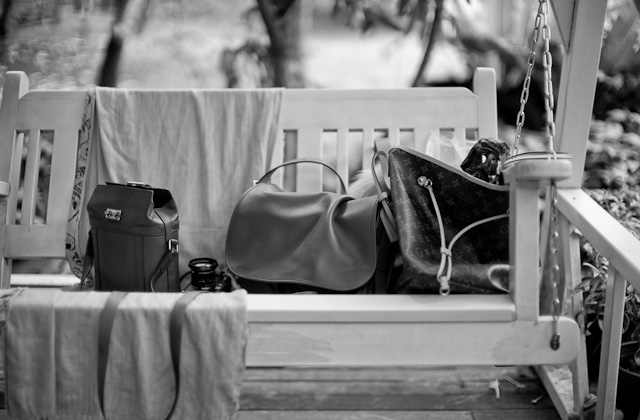 Camera bag nirvana ... Louis Vuitton Binocular Bag, Hermès Barda and Louis Vuitton Neverfull taking rest on a bench. 