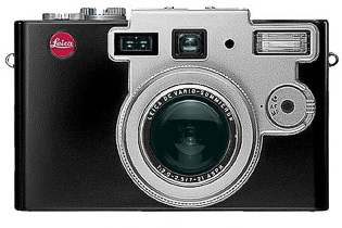 Leica Digilux 1 (Feb 2002) 
This is a beautiful camera, charming and had images that was film-like. Panasonic made a sister-camera, the Panasonic DCM-LC5. Read my article on Digilux 1 here. 
4MP / $1,500.00 / 36,000 pcs. made / 460 g.