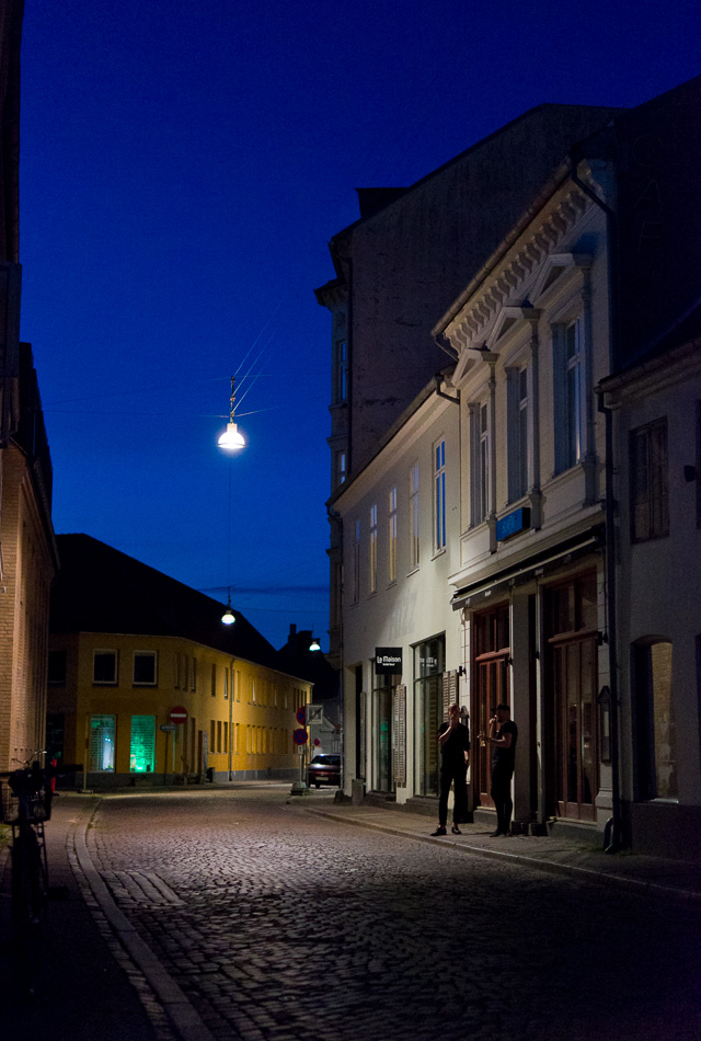 Scandinavian summer evenings "blue hour" just after sunset that is 10:00 PM in the summer. Here the camera adjusted for the tungsten light in the street, making the sky even more sparkling blue than it looks to the eye. Leica TL2 with Leica 35mm Summilux-TL ASPH f/1.4. © 2017 Thorsten Overgaard.