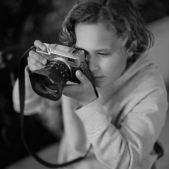 Young man (12) with his new Leica Digilux 2. Leica M10-P with Leica 50mm Noctilux-M ASPH f/0.95. © Thorsten Overgaard. 