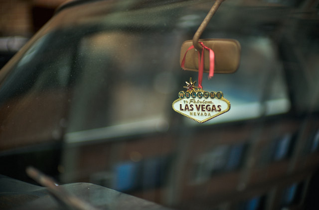 A classic car on 11th Street, displaying with glory and rust, and then this "Welcome to Faboulous Las Vegas" metal plate. Leica M10-R with Leica 50mm Noctilux-M ASPH f/0.95. © Thorsten Overgaard. 