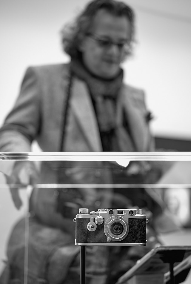 Amitava Chatterjee from Washington DC admirinng some of the old Leica cameras. Leica M10-P with Leica 50mm APO-Summicronn-M ASPH f/2.0 LHSA. © Thorsten Overgaard.