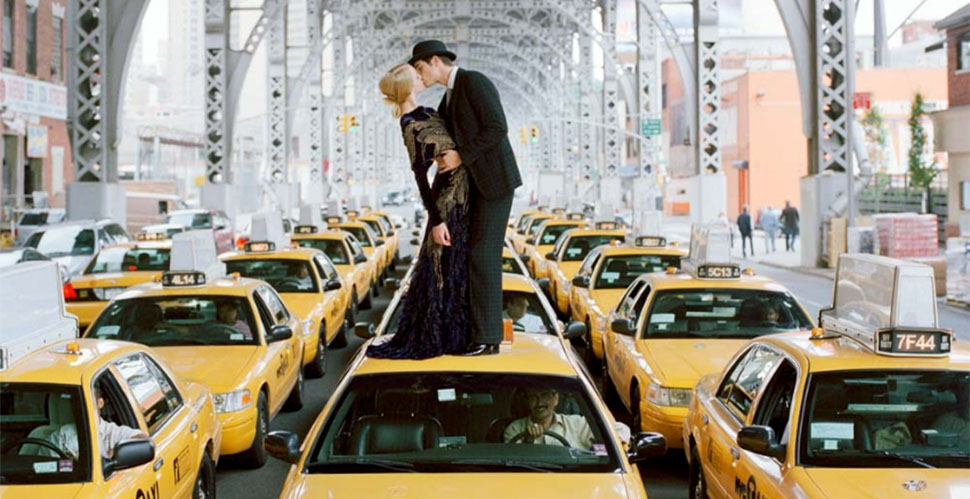 "Andrew and Edythe Kissing on a Sea of Cabs" 2009 by Rodney Smith.