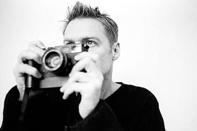 Bryan Adams with his Leica film camera. 