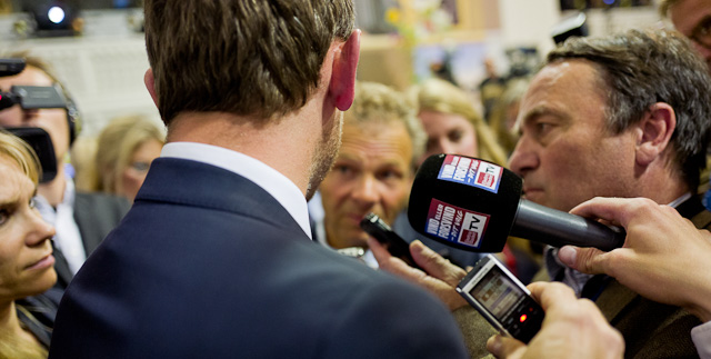 Election night in Denmark, June 2015. Chairman of the Venstre party, Kristian Jensen, arrives into a media storm. Leica Q (1600 ISO, f/1.7, 1/500 second). © 2015 Thorsten Overgaard.