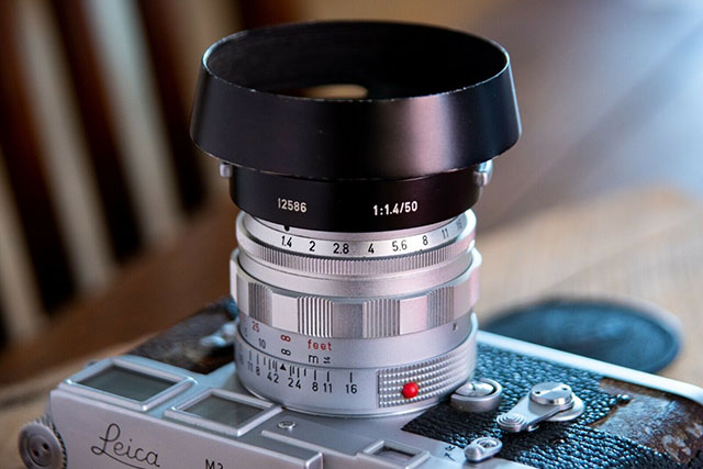 The Leica 50mm Summilux-M ASPH f/1.4 Version II (1962) with ventilated hood (order no 12586) 