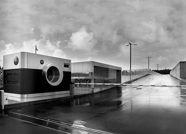 The entrance to Leica Camera in Porto in Portugal featuer this large Leica M camera that houses the security.   