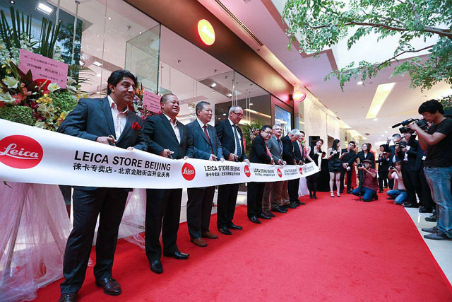 October 14, 2013: Leica Store ribbon cutting in Beijing, China. Far left is CEO of Leica Camera Pacific Asia Pte. Ltd., Sunil Kaul and number fourth from left is CEO of Leica Camera AG, Alfred Schopf. 
