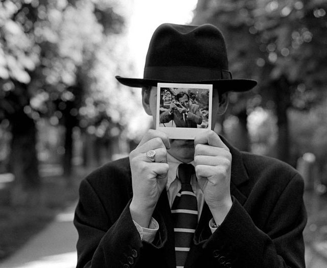 Rodney Smith (1947-2016) was a Leica M4 user in New York, and then a Hasselblad 500 with 80mm user for most of his work. You could say he primarly created photographs He thought them out, arranged them and made them. HHis photos are popular for interiors, with an element of both composition genius and humor. This photo taken with a Hasselblad shows a Polaroid of Rodney Smith with his Leica - a sort of crosspoint in his career. But he never shot digital, so he used both Leica M4 and Hasselblad in 2015. Many Leica users have a soft spot for Hasselblad, just as manuy Hasselblad users have a soft spot for Leica.