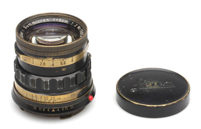 Photografica in Copenhagen had this rare sample for sale for $22,000 of a 1958 Summicron in Black Paint (serial no 1587449).